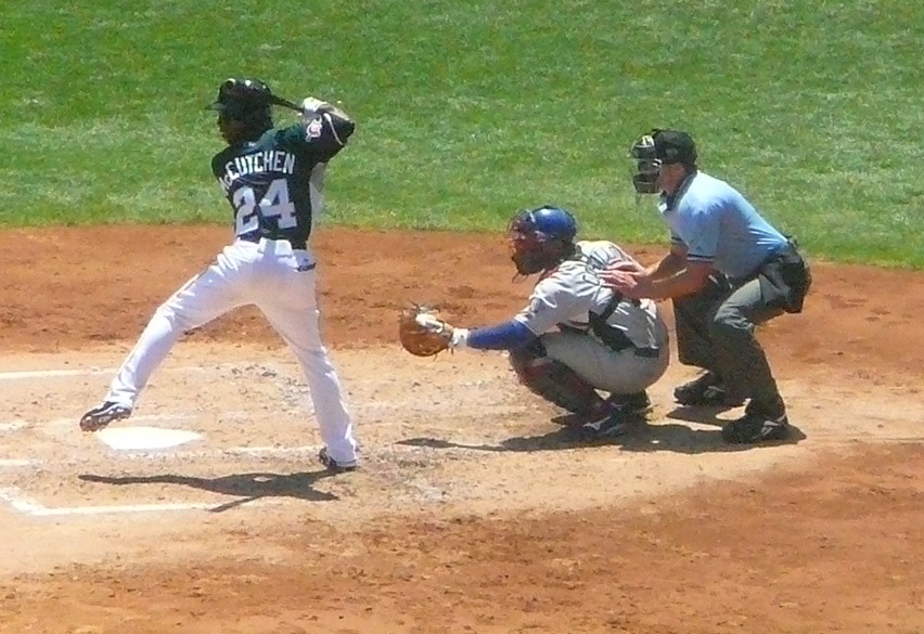 Florida Marlins' Jorge Cantu bumps arms with Dan Uggla, who hit a